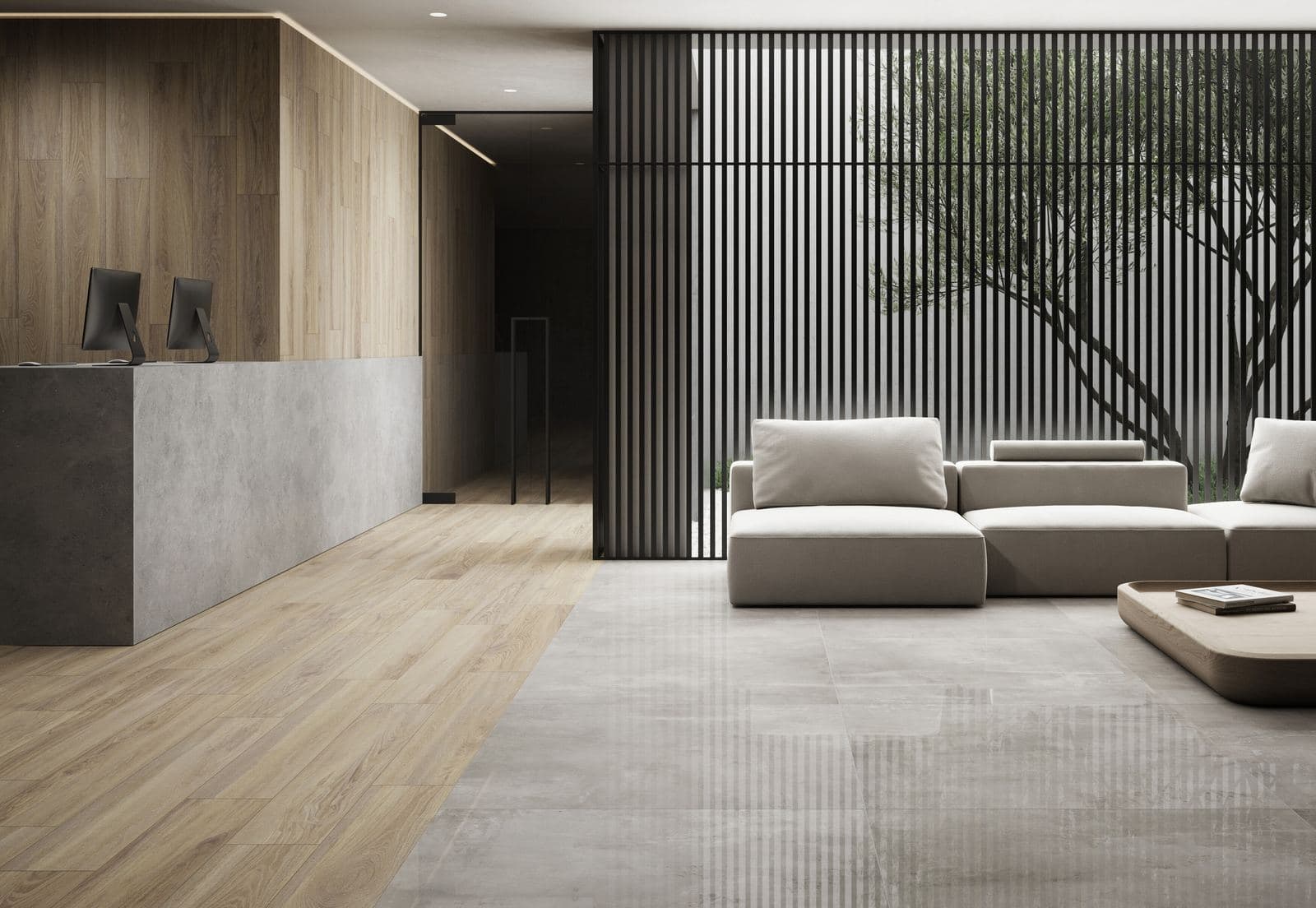 Large-format grey concrete-look porcelain in a modern interior